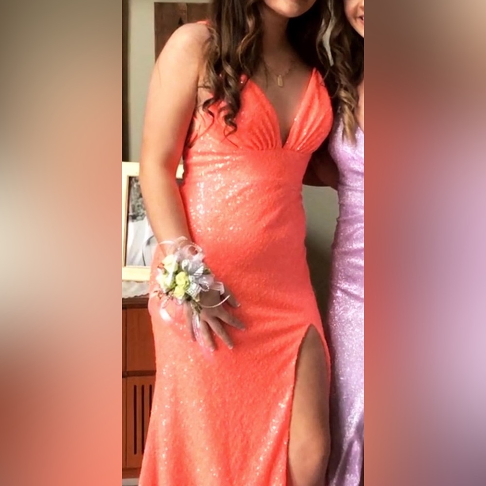 size 6, worn once, has slit down leg and open back. in good condition.